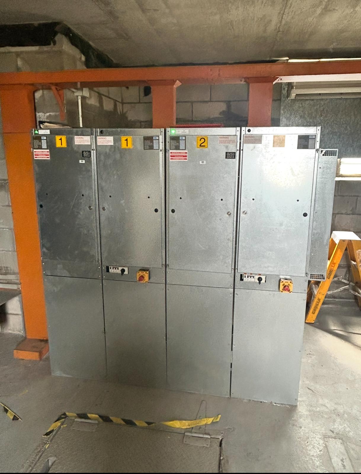 Row of new commercial switchboard cabinets installed at a shopping centre