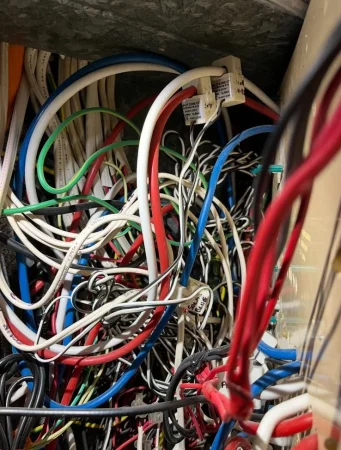 Uncoordinated control wiring inside a commercial main switchboard before upgrade